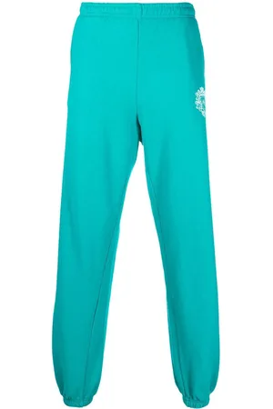 Sporty & Rich Crest logo print track pants
