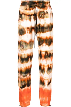 AMIRI Tie-dye print cotton track pants