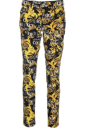 VERSACE Logo-print skinny jeans