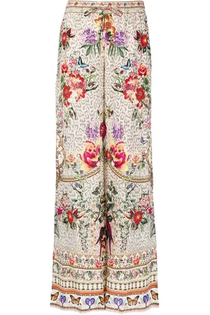 Camilla Flared floral-print trousers