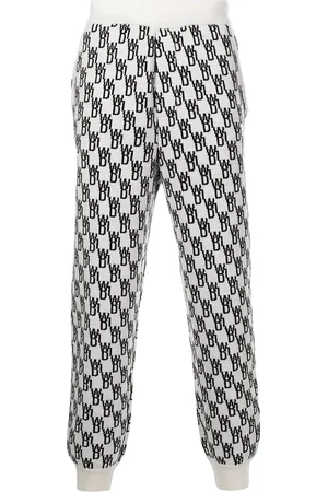 We11 Done Monogram intarsia-knit track pants