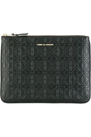 Comme des Garçons Embossed leather wallet