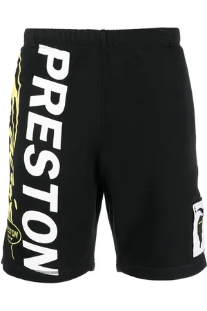 Heron Preston Logo-print jersey track shorts
