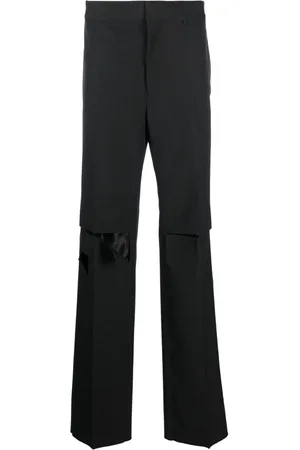 Givenchy Distressed wool trousers