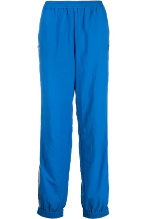 AMBUSH Stripe-detailing logo-print track pants