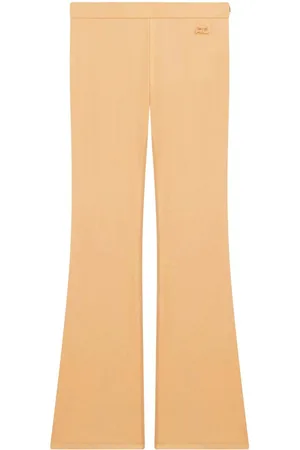 Courrèges Embroidered logo flared-leg trousers