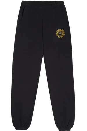 Sporty & Rich Crest-print cotton track pants
