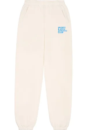 Sporty & Rich Slogan-print cotton track pants