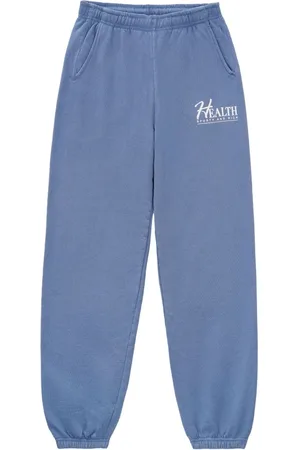 Sporty & Rich Slogan-print cotton track pants