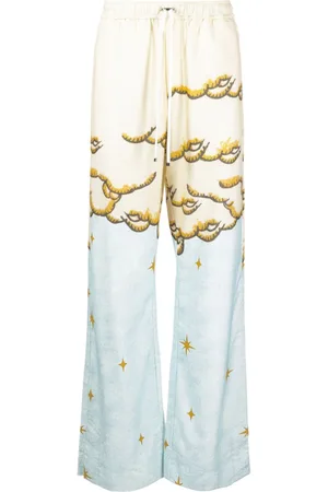 AMIRI Sunscape-print flared trousers