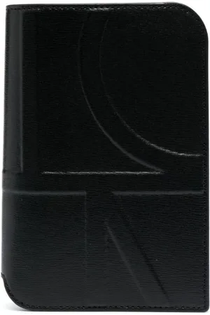 Totême Monogram leather passport holder