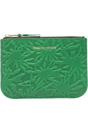 Comme des Garçons Embossed leather wallet
