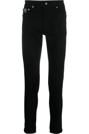 VERSACE Logo-patch cotton trousers