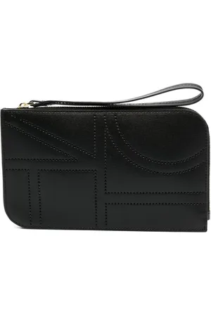 Totême Perforated monogram clutch