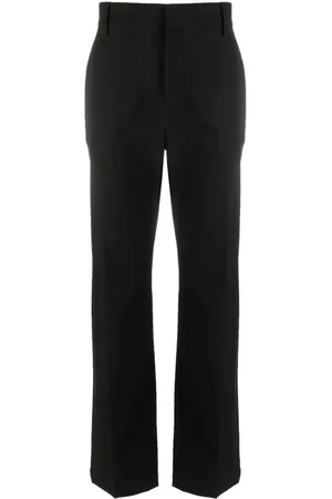 VALENTINO GARAVANI Rockstud-embellished tailored trousers