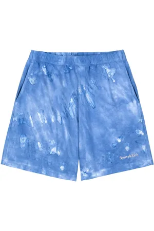 Sporty & Rich Logo-embroidered cotton track shorts