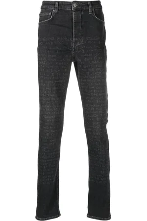 KSUBI Text-print mid-rise tapered jeans