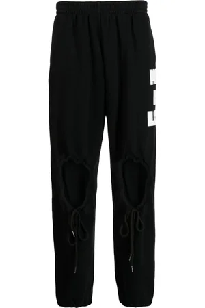 Natasha Zinko Heart-shaped cut-out detail track pants