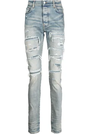 AMIRI Varsity ripped skinny jeans