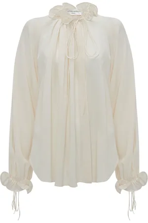 Victoria Beckham Ruffle-trim pleated silk blouse