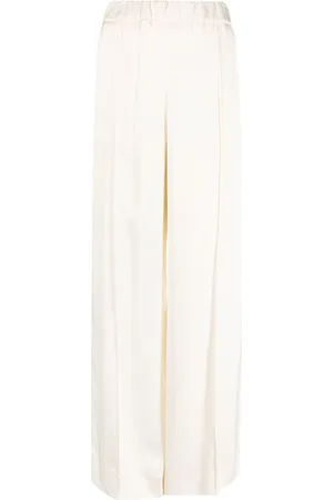 Jil Sander Pressed-crease elasticated-waist flared trousers