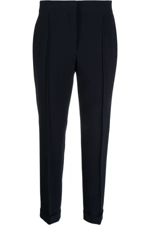Moschino Pressed-crease concealed-fastening tapered trousers