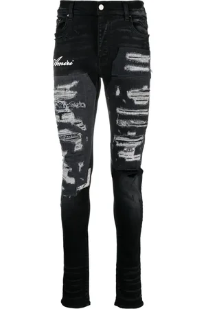 AMIRI Artisanal distressed slim-fit jeans