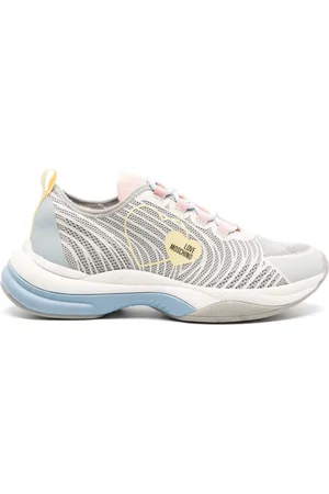 Moschino Logo-patch panelled sneakers