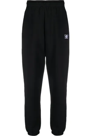 ROTATE Logo-embroidered organic cotton track pants