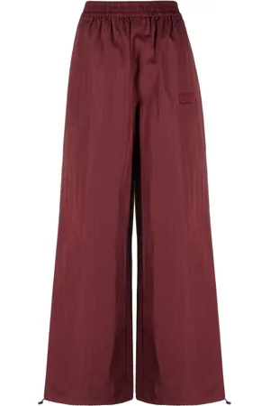 ROTATE Logo-embroidered elasticated-waist palazzo trousers