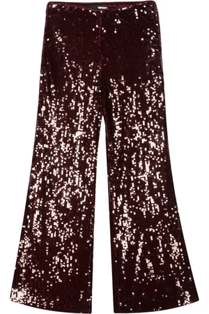 ROTATE High-waisted flared sequinned trousers
