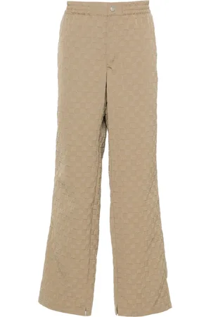 MISBHV Debossed-logo straight-leg trousers