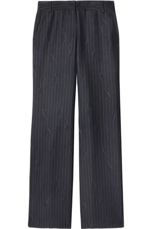 OFF-WHITE Pinstripe-pattern virgin wool-blend trousers