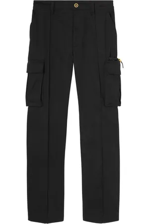 VERSACE Pressed-crease cotton drop-crotch trousers