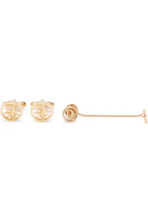 Dior 1990s logo-letters brooch and cufflinks set