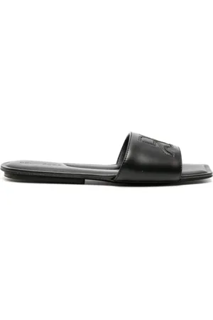Courrèges Logo-patch leather slides