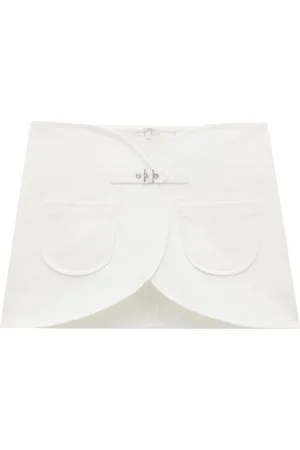 Courrèges Ellipse buckle-strap denim miniskirt