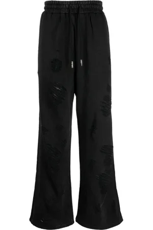 Feng Chen Wang Ripped track pants