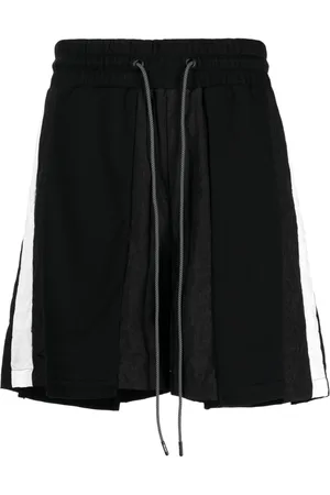 MOSTLY HEARD RARELY SEEN Striped panelled cotton track shorts