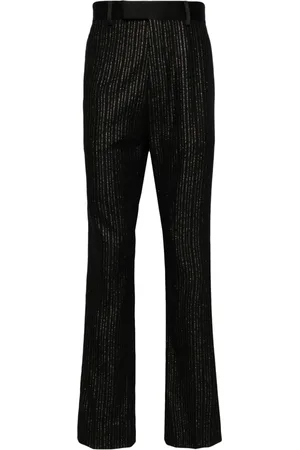 AMIRI Pinstriped wool-blend trousers