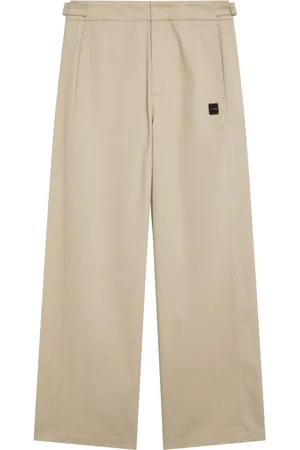 AGNÈS B. Logo-patch wide-leg trousers