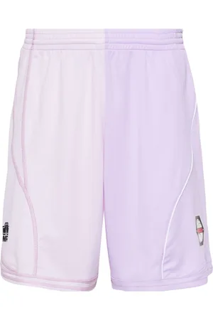 MARTINE ROSE Half and Half football shorts