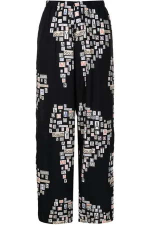 AMIR SLAMA Text-print straight-leg trousers