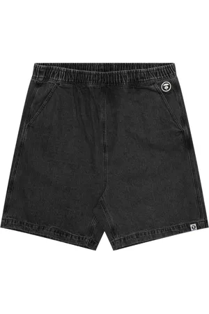 A Bathing Ape Moonface-appliqué denim shorts