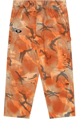 A Bathing Ape Spray paint-effect camouflage trousers