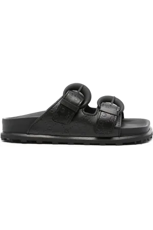 Marine Serre Monogram-embossed leather slides