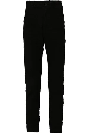 POÈME BOHÉMIEN Crinkled slim-cut trousers