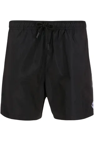 MARCELO BURLON Embroidered logo swim shorts