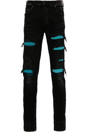 AMIRI Suede-embellished skinny jeans