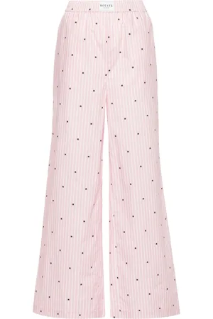 ROTATE Logo-print striped straight trousers